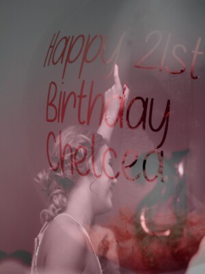 A well shot photo of a girl in the reflection of a balloon.