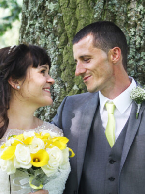A well shot photo of a groom and a bride.