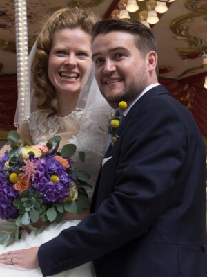A well shot photo of a groom and a bride.