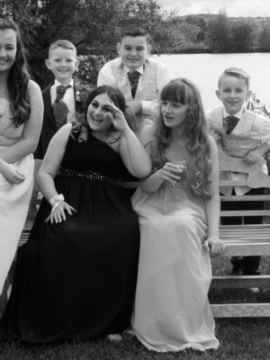 An image of a family gathered at a wedding
