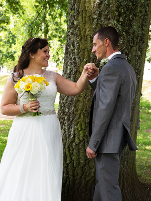 A well shot photo of a groom and a bride.